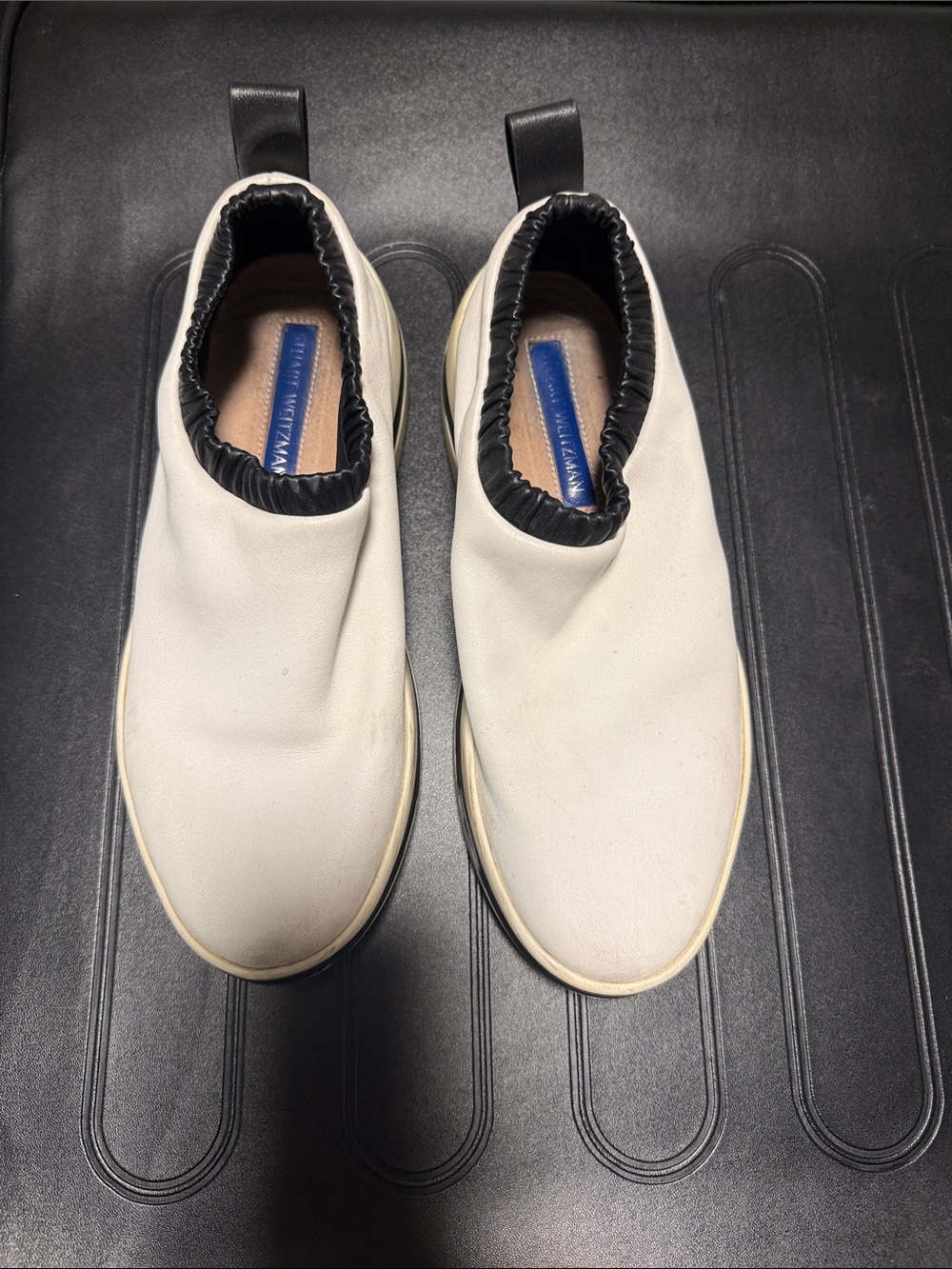 Stuart Weitzman White Slip-On Loafers with Black Trim